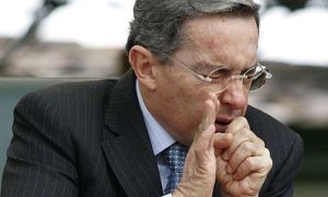 Álvaro Uribe sneezes  - please work on your cough etiquette and set an example